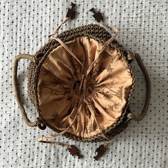 Cappelli Straworld Straw Cinched Tote Bag Island Print Wooden Palm Tree Charms - Picture 2 of 11